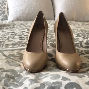 Nude closed toe heels with rose gold heel